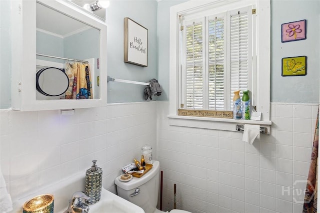 122 W 61st St, Savannah, GA 31405 - bathroom with tile walls, ornamental molding, wainscoting, and a shower with curtain