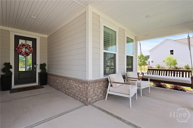 742 Longleaf Dr, Richmond Hill, GA 31324 - entrance to property with covered porch and brick siding