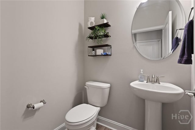 742 Longleaf Dr, Richmond Hill, GA 31324 - bathroom featuring toilet and baseboards