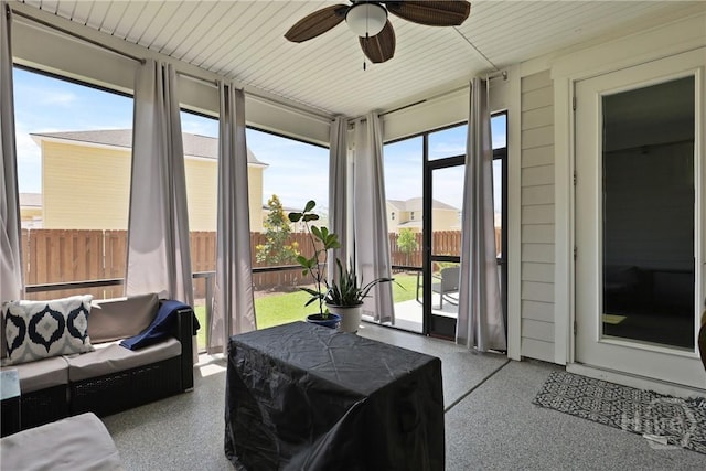 742 Longleaf Dr, Richmond Hill, GA 31324 - sunroom featuring an outdoor hangout area, speckle patterned floor, and a ceiling fan