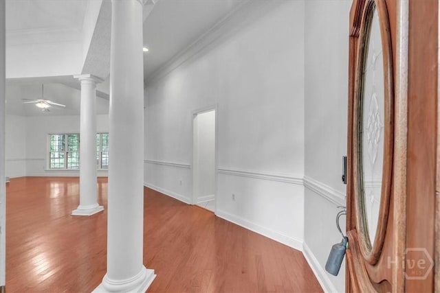 80 Windsong Dr, Richmond Hill, GA 31324 - foyer with decorative columns, ceiling fan, ornamental molding, and wood finished floors