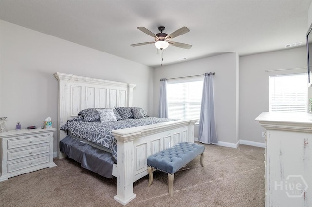 333 Providence Trce, Statesboro, GA 30461 - bedroom with light carpet, multiple windows, and a ceiling fan