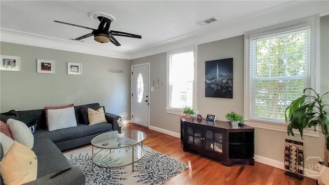 202 Columbus Dr, Savannah, GA 31405 - living area featuring plenty of natural light, ceiling fan, and wood finished floors