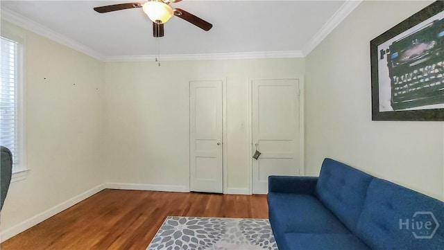 202 Columbus Dr, Savannah, GA 31405 - unfurnished room with wood finished floors, a ceiling fan, and crown molding