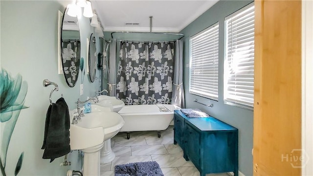 202 Columbus Dr, Savannah, GA 31405 - full bath featuring crown molding and shower / bath combo