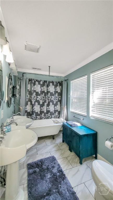 202 Columbus Dr, Savannah, GA 31405 - full bath with a freestanding bath and crown molding
