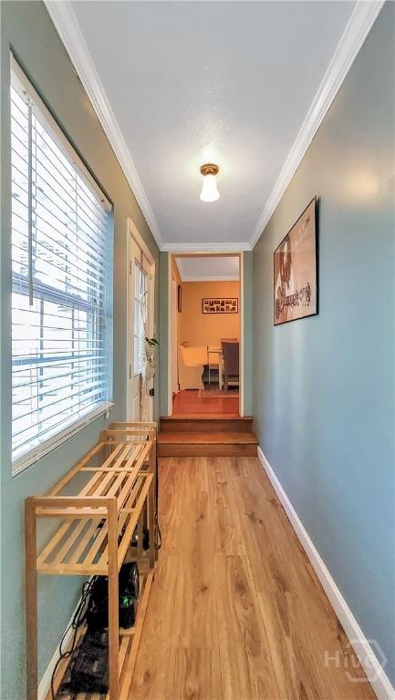 202 Columbus Dr, Savannah, GA 31405 - hallway featuring crown molding and light wood finished floors