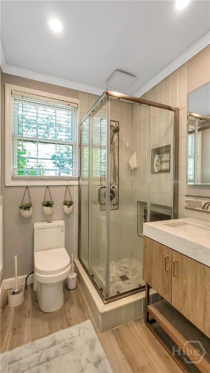202 Columbus Dr, Savannah, GA 31405 - full bath featuring wood finished floors, vanity, a stall shower, crown molding, and recessed lighting