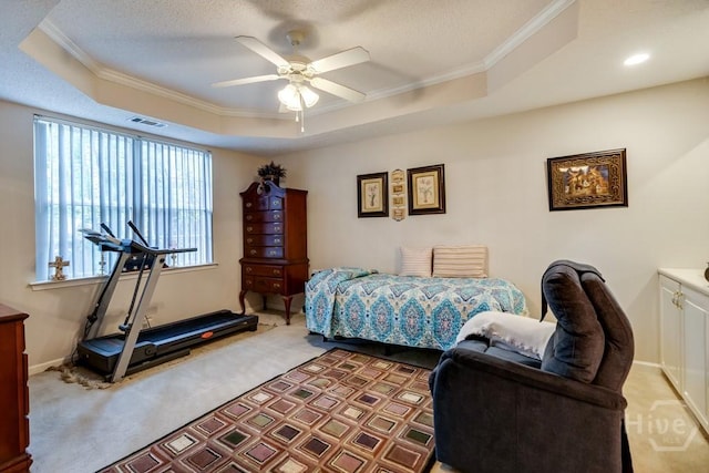 12 Crossing Dr, Richmond Hill, GA 31324 - carpeted bedroom featuring ornamental molding, a raised ceiling, ceiling fan, and a textured ceiling