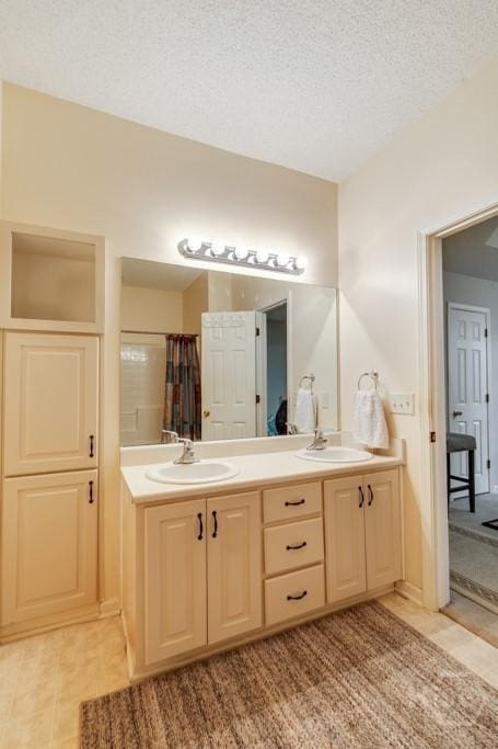 12 Crossing Dr, Richmond Hill, GA 31324 - full bathroom with double vanity, a textured ceiling, and tile patterned flooring