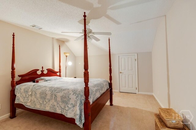 12 Crossing Dr, Richmond Hill, GA 31324 - carpeted bedroom featuring vaulted ceiling and a ceiling fan