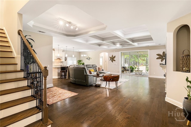 28 Misty Marsh Dr, Savannah, GA 31419 - living area featuring arched walkways, ceiling fan, dark wood-style flooring, stairway, and crown molding