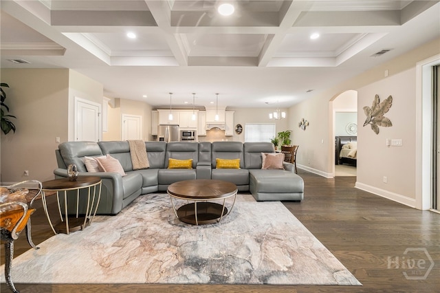 28 Misty Marsh Dr, Savannah, GA 31419 - living area with coffered ceiling, arched walkways, dark wood finished floors, recessed lighting, and beam ceiling