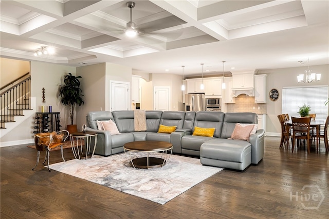 28 Misty Marsh Dr, Savannah, GA 31419 - living area featuring stairway, dark wood finished floors, ceiling fan, a chandelier, and coffered ceiling