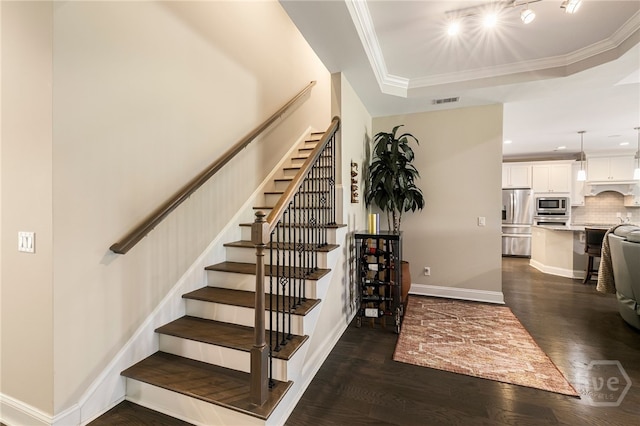 28 Misty Marsh Dr, Savannah, GA 31419 - stairs with wood finished floors, a tray ceiling, crown molding, and recessed lighting