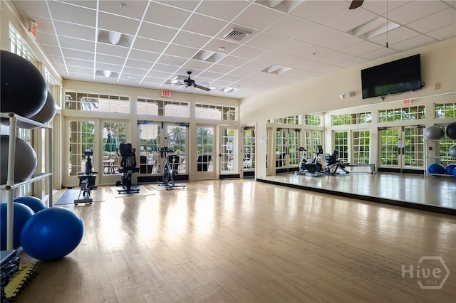 28 Misty Marsh Dr, Savannah, GA 31419 - exercise room with french doors, a drop ceiling, a ceiling fan, wood finished floors, and a towering ceiling