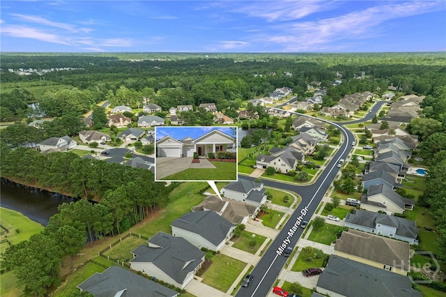 28 Misty Marsh Dr, Savannah, GA 31419 - aerial overview of property's location with nearby suburban area and a nearby body of water