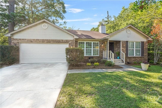 139 Crossover Ln, Savannah, GA 31410 - ranch-style home with concrete driveway, brick siding, a chimney, a garage, and a front yard