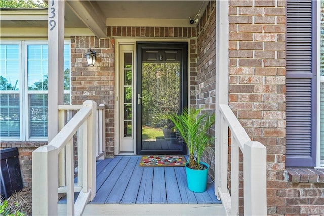 139 Crossover Ln, Savannah, GA 31410 - property entrance with brick siding and covered porch