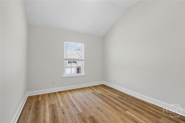 13 Abaco Ct, Savannah, GA 31419 - spare room with vaulted ceiling and light wood-type flooring