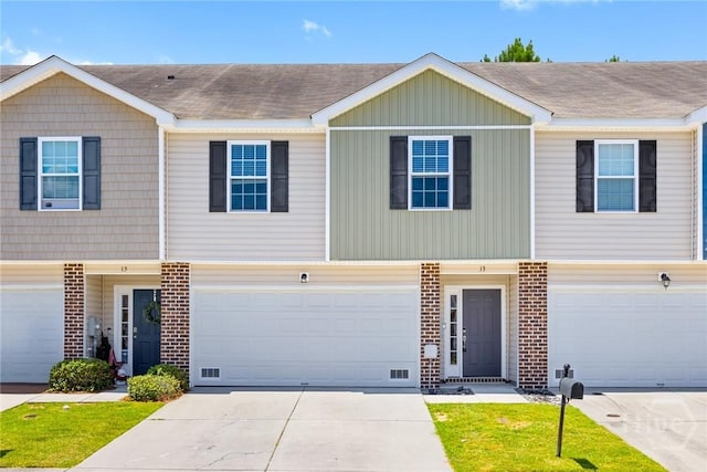 13 Abaco Ct, Savannah, GA 31419 - multi unit property featuring brick siding, driveway, a shingled roof, and an attached garage