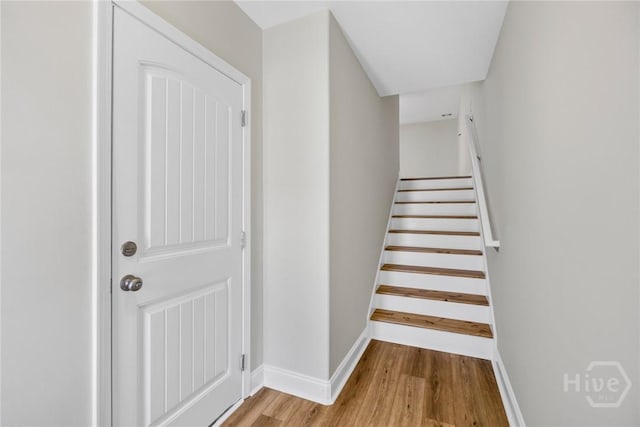 13 Abaco Ct, Savannah, GA 31419 - staircase featuring wood finished floors and baseboards