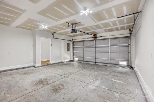 13 Abaco Ct, Savannah, GA 31419 - garage featuring a garage door opener and electric panel