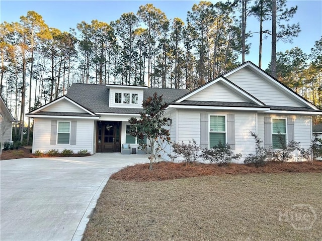 275 Heron Ct, Saint Marys, GA 31558 - view of front facade with a shingled roof and concrete driveway