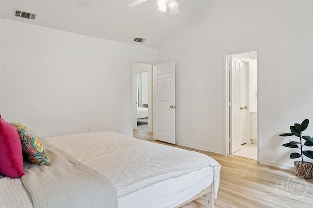 4 Jackson Ct, Savannah, GA 31405 - bedroom with light wood-style flooring, vaulted ceiling, a ceiling fan, and connected bathroom