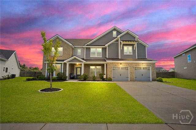 11 Shoefstall St, Savannah, GA 31407 - view of front of property featuring driveway, a garage, and brick siding