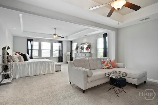 11 Shoefstall St, Savannah, GA 31407 - carpeted bedroom featuring a tray ceiling and a ceiling fan
