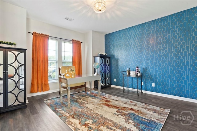 11 Shoefstall St, Savannah, GA 31407 - office featuring wallpapered walls, dark wood-style flooring, and an accent wall