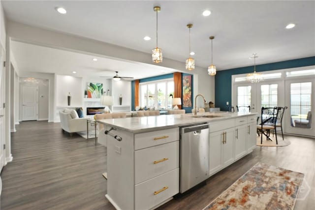 11 Shoefstall St, Savannah, GA 31407 - kitchen featuring dishwasher, ceiling fan, dark wood-style flooring, white cabinets, and recessed lighting