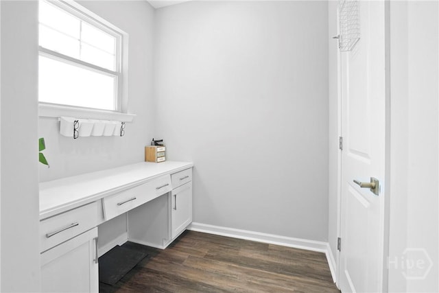 11 Shoefstall St, Savannah, GA 31407 - office space featuring built in desk and dark wood-style flooring