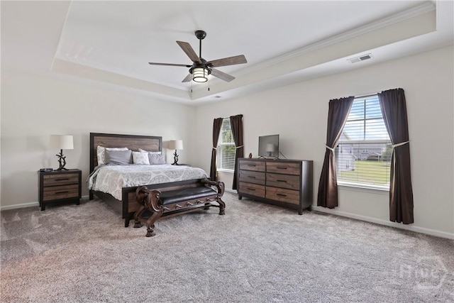 30 Melody Dr, Pooler, GA 31322 - carpeted bedroom featuring a tray ceiling, multiple windows, crown molding, and a ceiling fan
