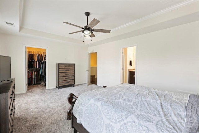 30 Melody Dr, Pooler, GA 31322 - bedroom with carpet flooring, a spacious closet, a tray ceiling, a closet, and ornamental molding