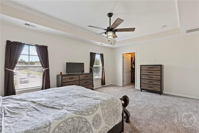 30 Melody Dr, Pooler, GA 31322 - bedroom with crown molding, a tray ceiling, a spacious closet, light carpet, and ceiling fan
