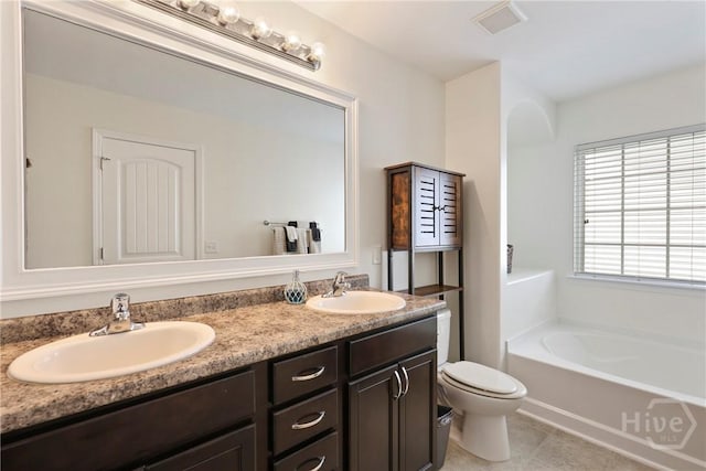 30 Melody Dr, Pooler, GA 31322 - bathroom featuring a garden tub, double vanity, and tile patterned floors