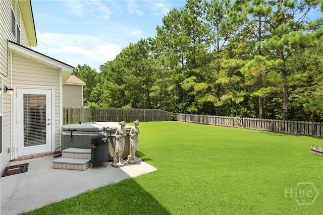 30 Melody Dr, Pooler, GA 31322 - fenced backyard with a hot tub and a patio area