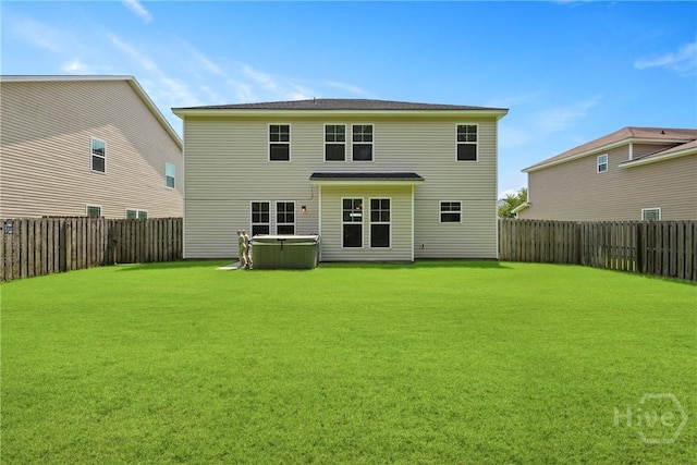 30 Melody Dr, Pooler, GA 31322 - rear view of house featuring a hot tub and a fenced backyard