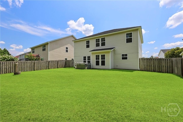 30 Melody Dr, Pooler, GA 31322 - rear view of house with a hot tub and a fenced backyard