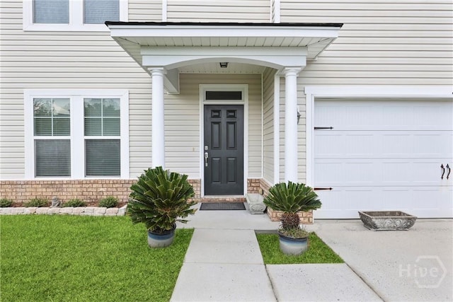 30 Melody Dr, Pooler, GA 31322 - property entrance with a yard and a garage