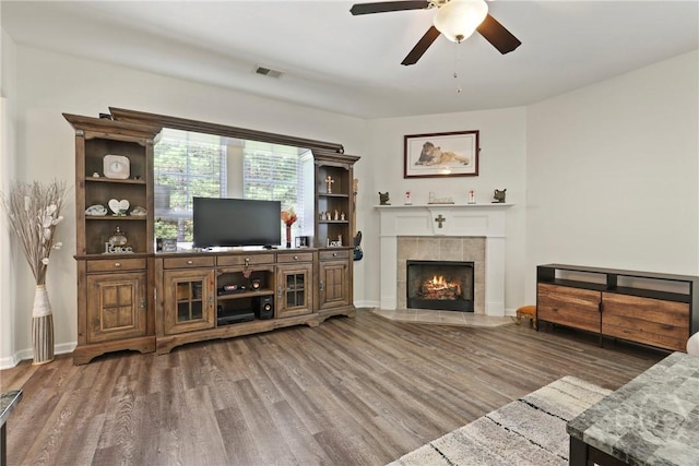 30 Melody Dr, Pooler, GA 31322 - living area with wood finished floors, a ceiling fan, and a tile fireplace