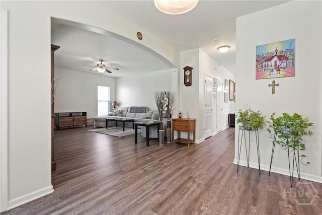 30 Melody Dr, Pooler, GA 31322 - living area featuring dark wood-style floors, arched walkways, and a ceiling fan