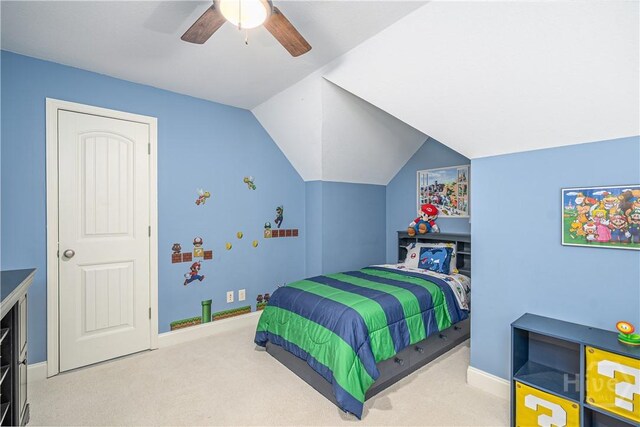 210 Windsong Dr, Richmond Hill, GA 31324 - carpeted bedroom featuring lofted ceiling and a ceiling fan
