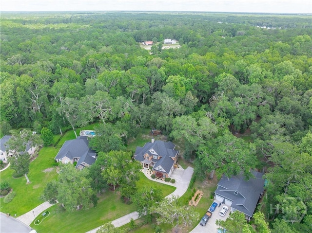210 Windsong Dr, Richmond Hill, GA 31324 - aerial view of property and surrounding area featuring a forest and nearby suburban area