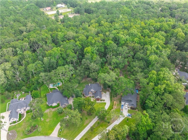 210 Windsong Dr, Richmond Hill, GA 31324 - aerial view of property and surrounding area with a heavily wooded area