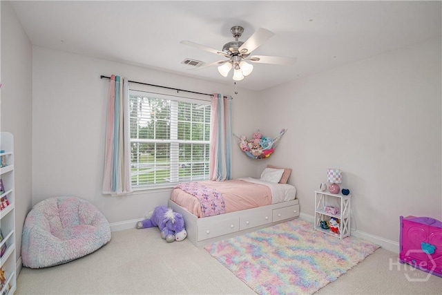 210 Windsong Dr, Richmond Hill, GA 31324 - carpeted bedroom featuring baseboards and ceiling fan