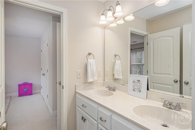210 Windsong Dr, Richmond Hill, GA 31324 - full bath featuring double vanity and a chandelier