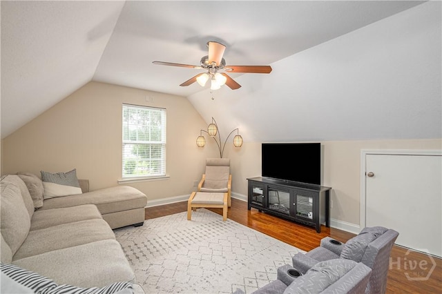 210 Windsong Dr, Richmond Hill, GA 31324 - living area featuring ceiling fan, wood finished floors, and lofted ceiling